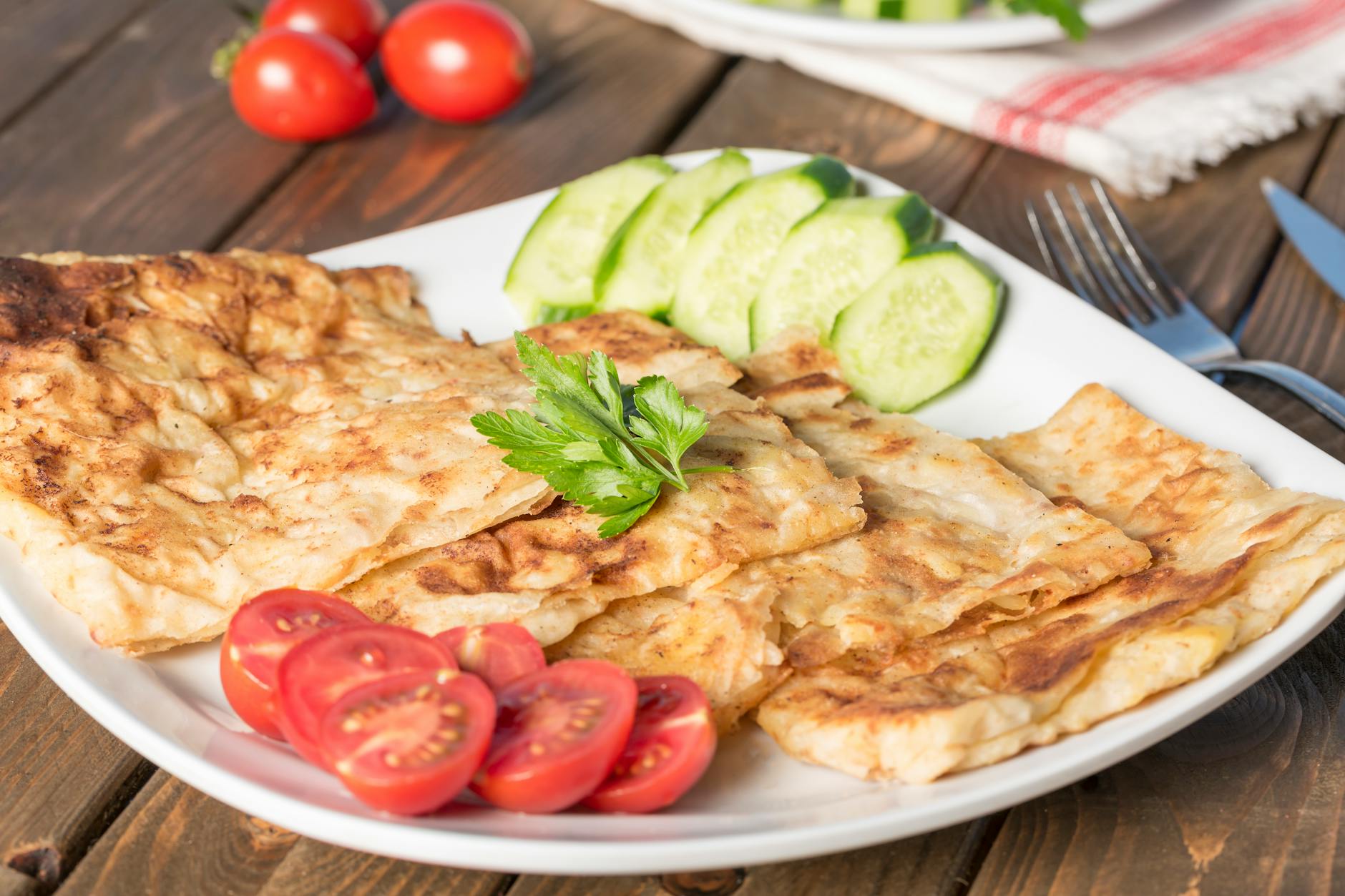Emirati breakfast with flatbread and tea